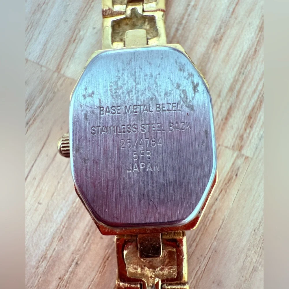 Armitron ladies octagonal gold tone diamond dress watch NEW BATTERY